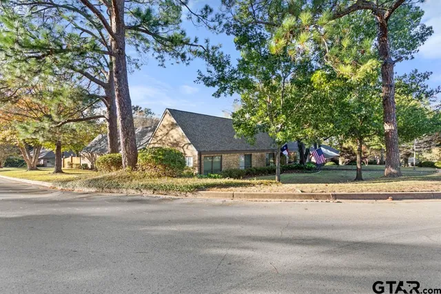 front view of a house with a street