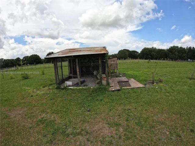 a view of a golf course with a lake