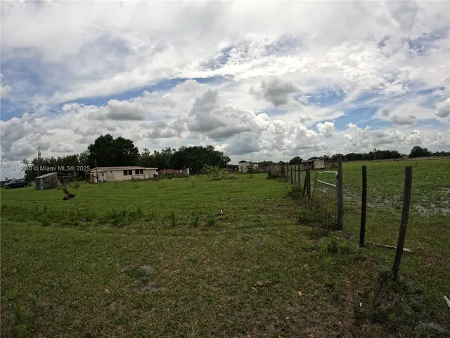 a view of a garden with a lake view