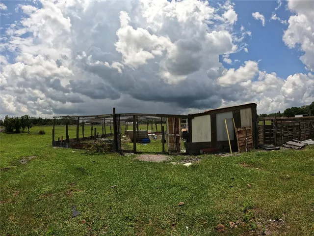 a view of building with yard