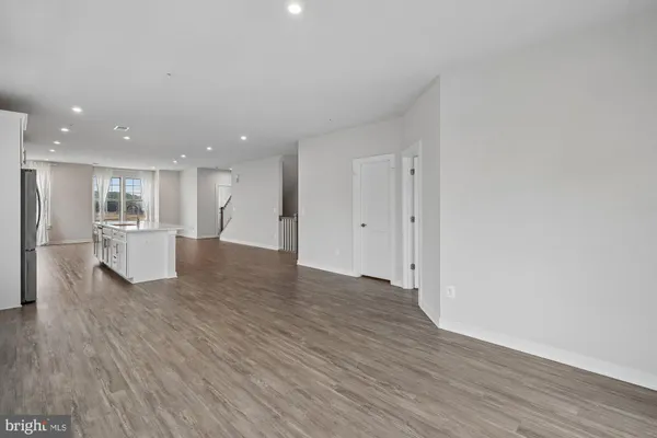 a view of kitchen with wooden floor