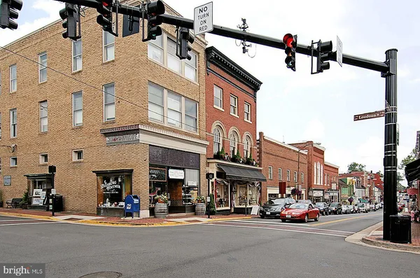 a view of a street with cars