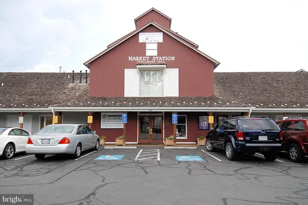 a view of a car park in front of building