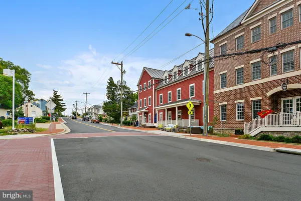 a view of a street with buildings