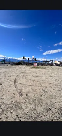 a view of beach and an ocean