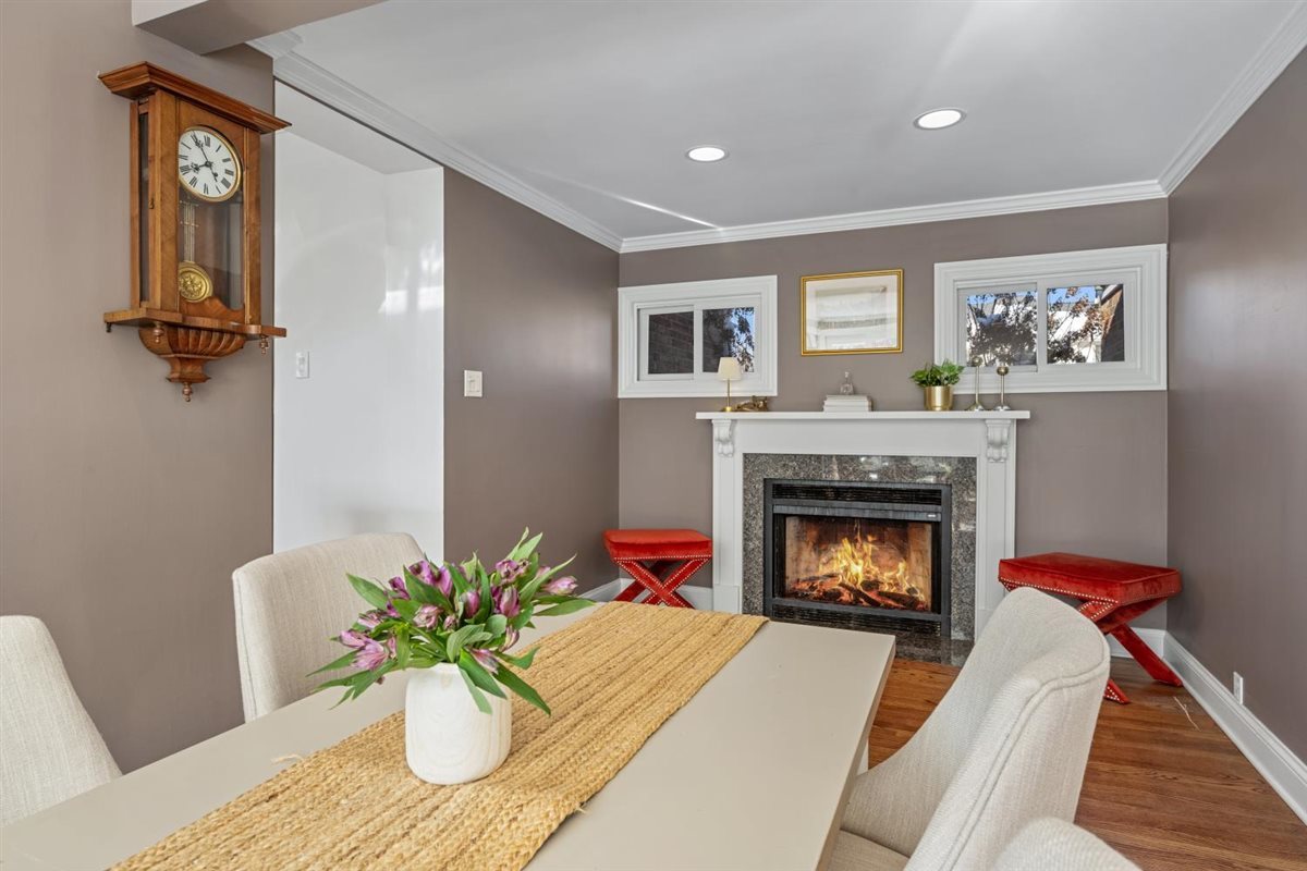 1821 George Court Glenview, IL 60025 - Photo 13 of 24 a living room with furniture and a fireplace