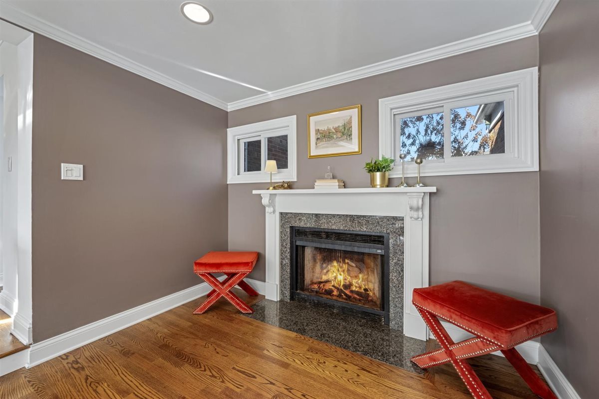 1821 George Court Glenview, IL 60025 - Photo 14 of 24 a living room with furniture and a fireplace