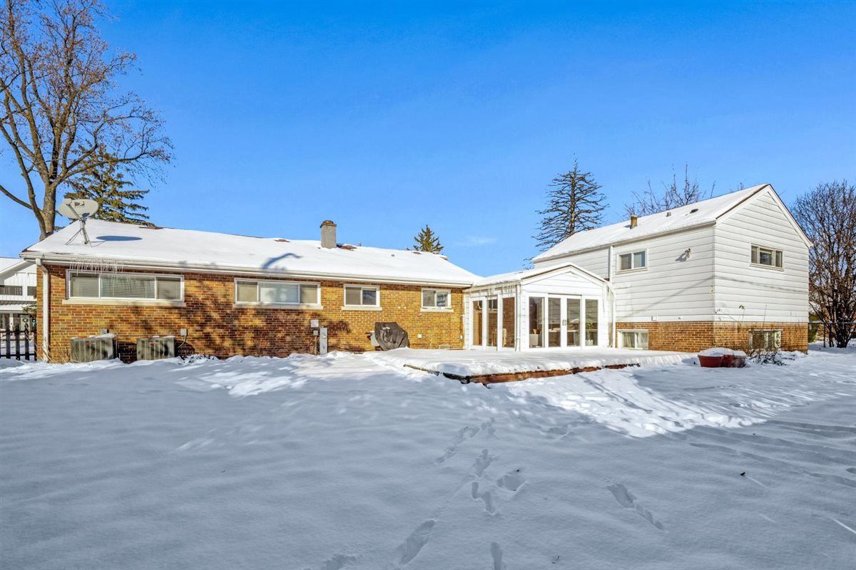 1821 George Court Glenview, IL 60025 - Photo 21 of 24 a front view of a house with a yard