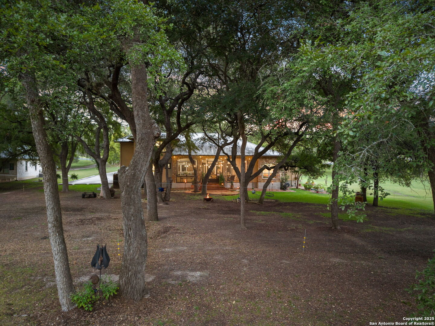 199 Shepherds Crook Helotes, TX 78023 - Photo 103 of 108 a view of a tree in the middle of a yard