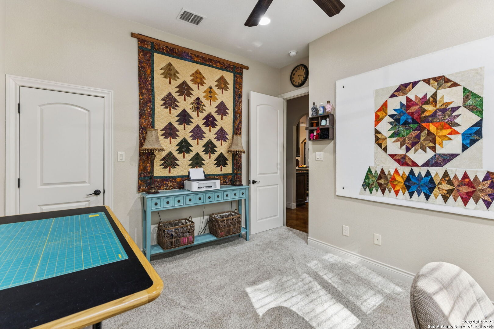 199 Shepherds Crook Helotes, TX 78023 - Photo 36 of 108 a room with painting on the wall and a fireplace