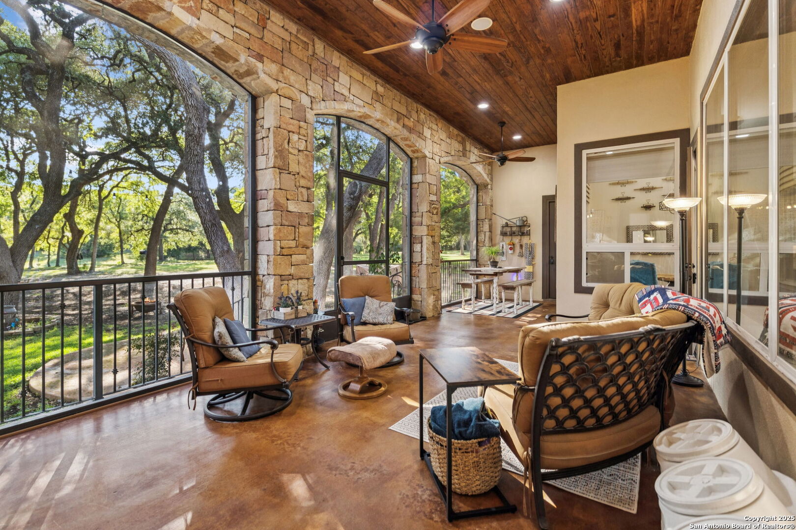 199 Shepherds Crook Helotes, TX 78023 - Photo 63 of 108 a living room with furniture and a floor to ceiling window