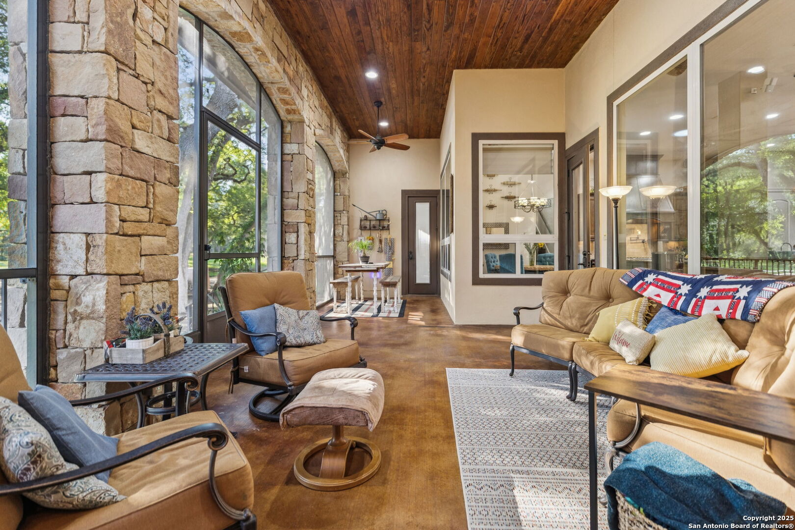 199 Shepherds Crook Helotes, TX 78023 - Photo 67 of 108 a living room with furniture and a large window