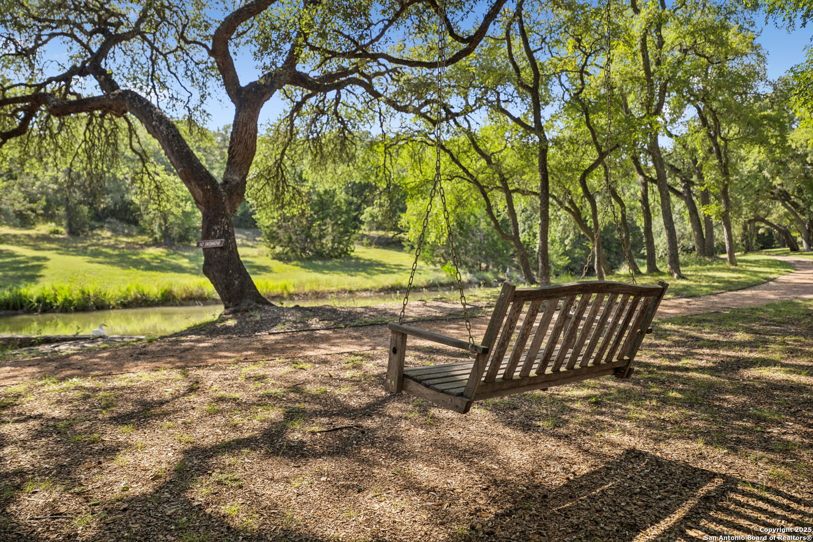 199 Shepherds Crook Helotes, TX 78023 - Photo 93 of 108 a view of park with a bench
