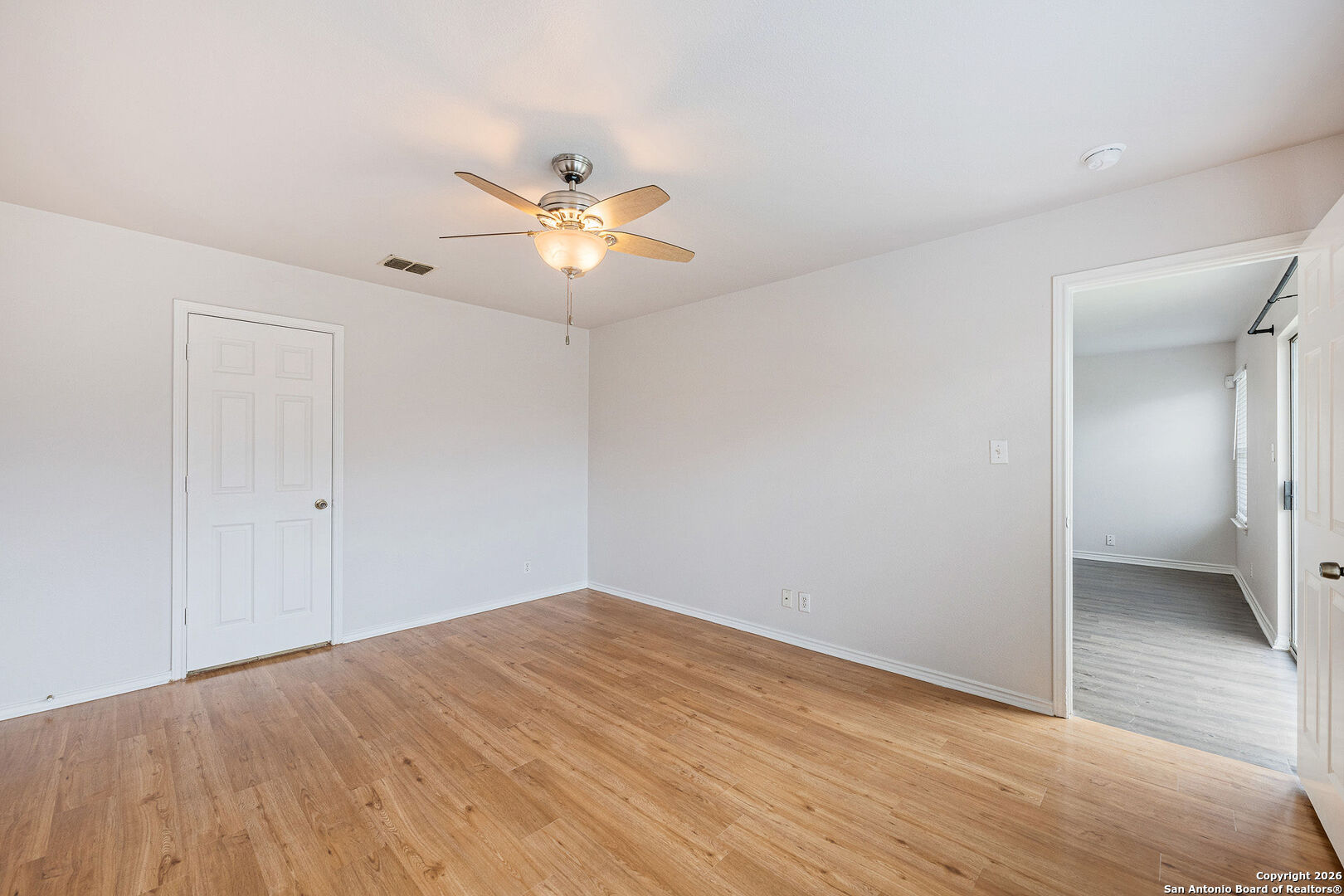2735 Moon Rock Converse, TX 78109 - Photo 12 of 21 a view of empty room with wooden floor