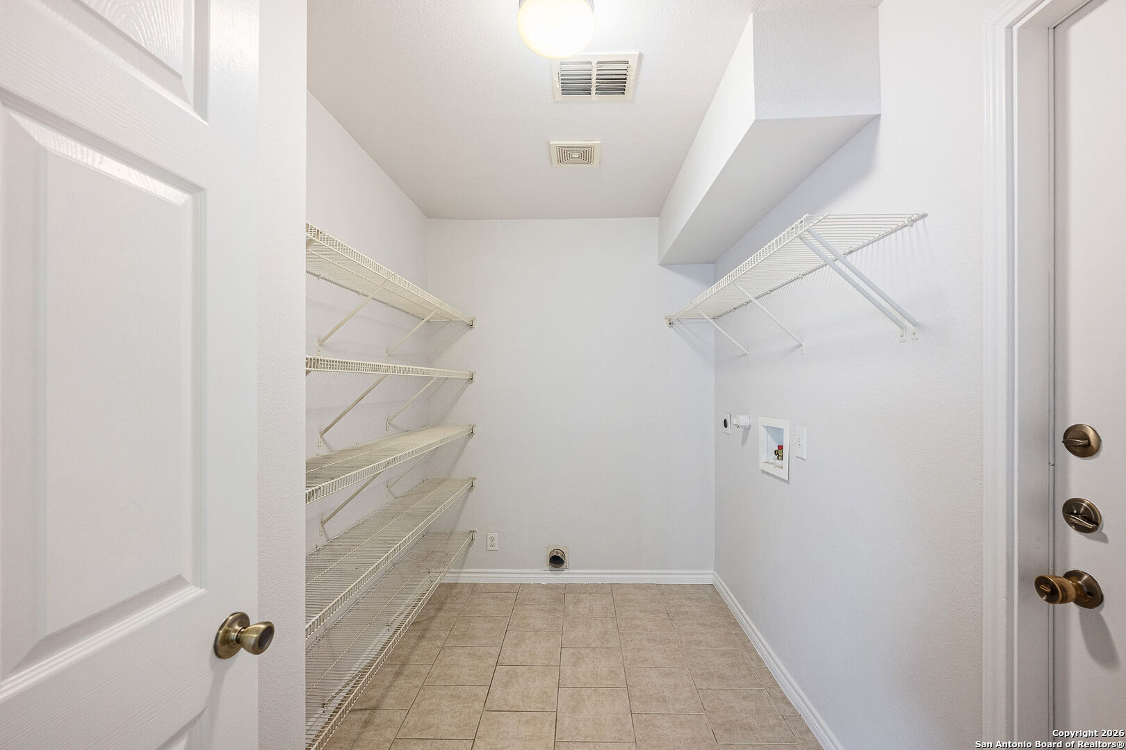 2735 Moon Rock Converse, TX 78109 - Photo 18 of 21 a view of an empty walk in closet