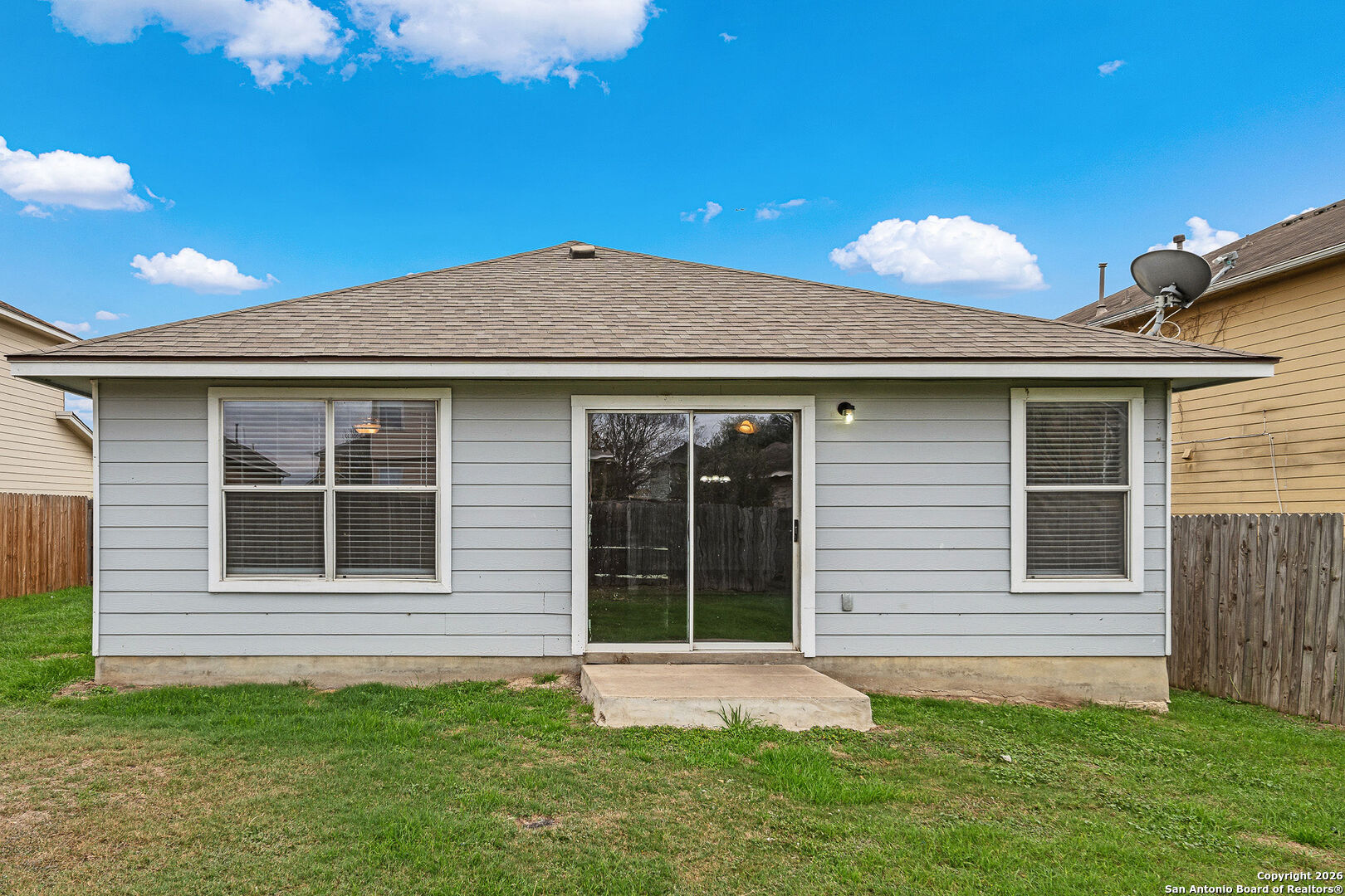 2735 Moon Rock Converse, TX 78109 - Photo 20 of 21 a front view of a house with a garden