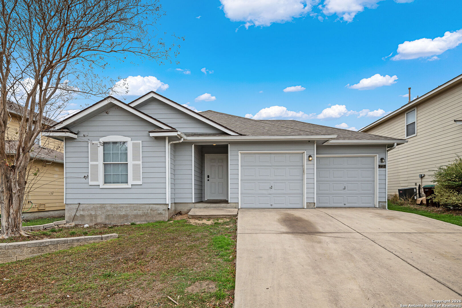 2735 Moon Rock Converse, TX 78109 - Photo 2 of 21 a front view of a house with garden