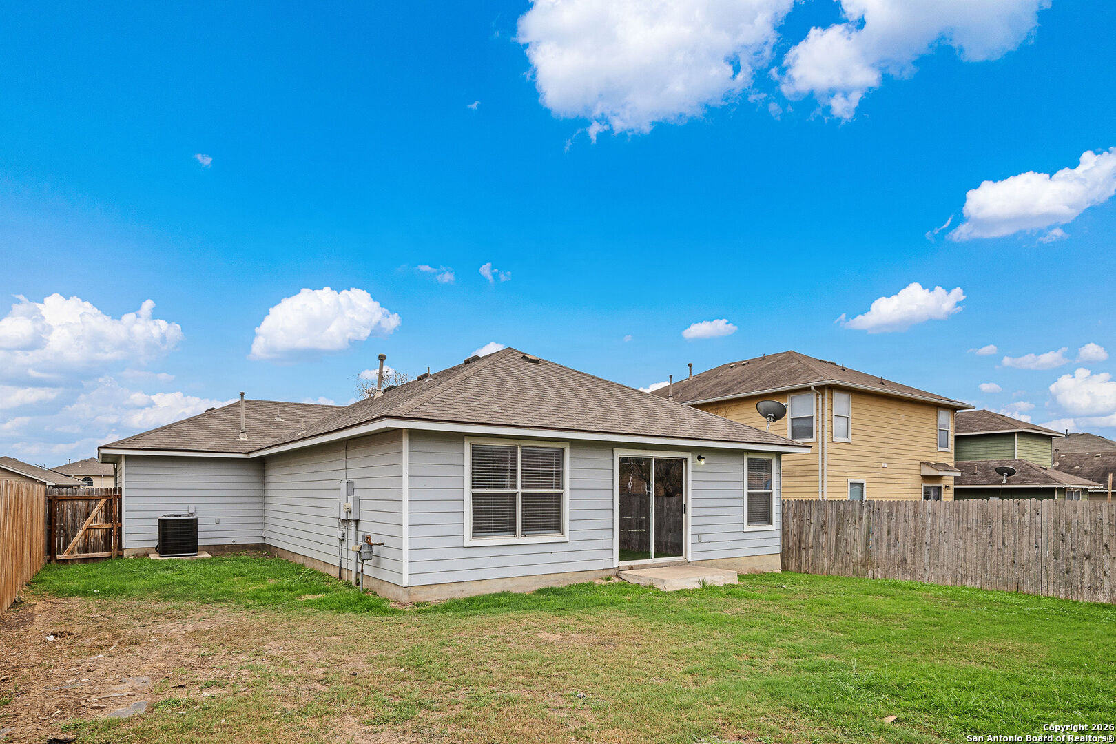 2735 Moon Rock Converse, TX 78109 - Photo 21 of 21 a front view of a house with a garden