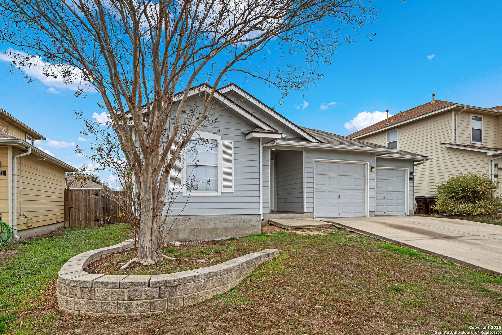 2735 Moon Rock Converse, TX 78109 - Photo 4 of 21 a front view of a house with a yard