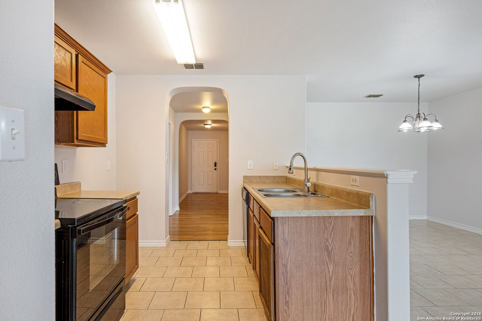 2735 Moon Rock Converse, TX 78109 - Photo 9 of 21 a kitchen with sink and mirror