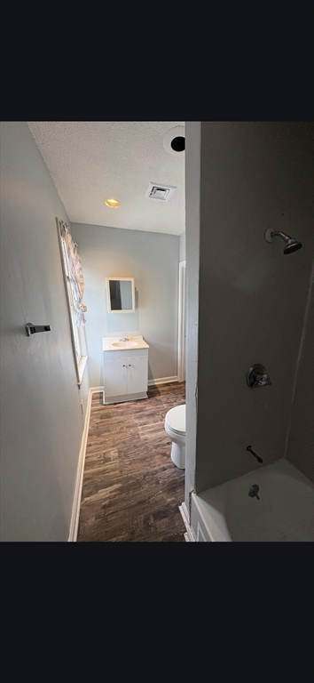 280 5th Street, Unit 3S Fall River, MA 02721 - Photo 11 of 12 a view of a hallway view with wooden floor and staircase