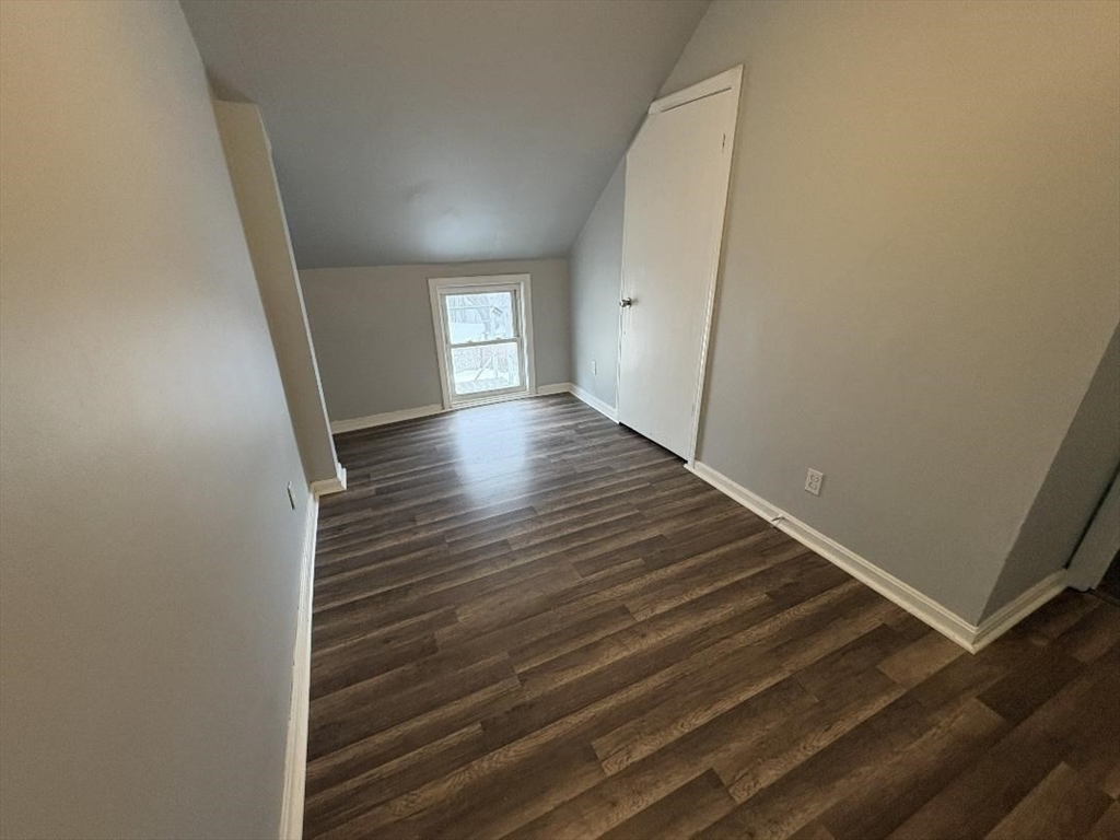 280 5th Street, Unit 3S Fall River, MA 02721 - Photo 8 of 12 a view of a hallway with wooden floor