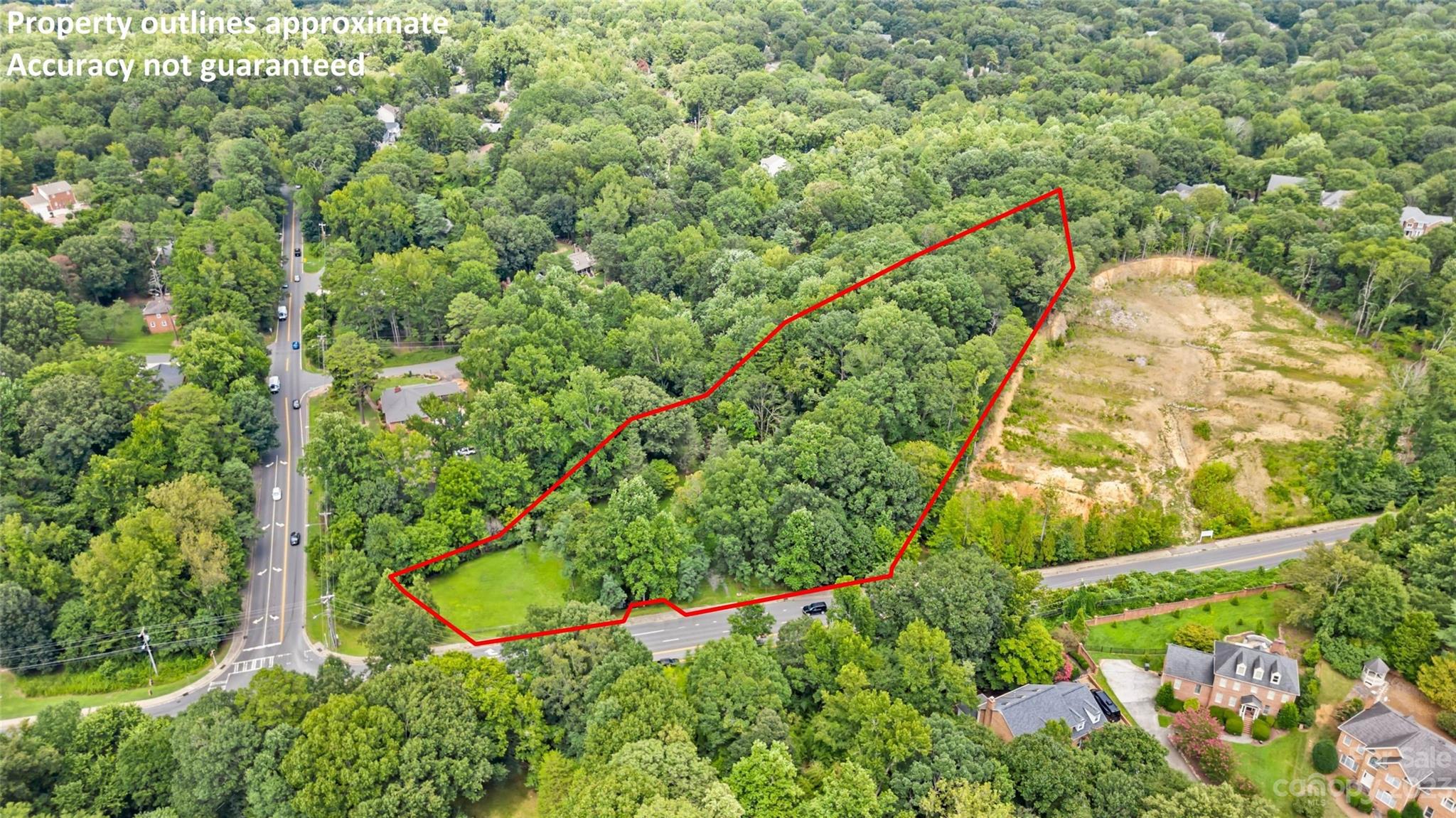 8105 Sardis Road Charlotte, NC 28270 - Photo 6 of 7 a view of a yard with plants