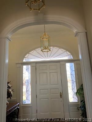 618 Leroy Autry Road Autryville, NC 28318 - Photo 3 of 35 a room with a window and chandelier