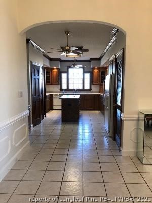 618 Leroy Autry Road Autryville, NC 28318 - Photo 8 of 35 a kitchen with granite countertop a refrigerator a stove a microwave and cabinets
