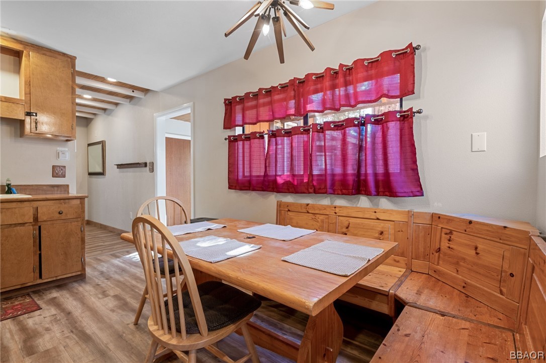 456 Riverside Avenue Sugarloaf, CA 92386 - Photo 5 of 19 a view of a dining room with furniture and chandelier