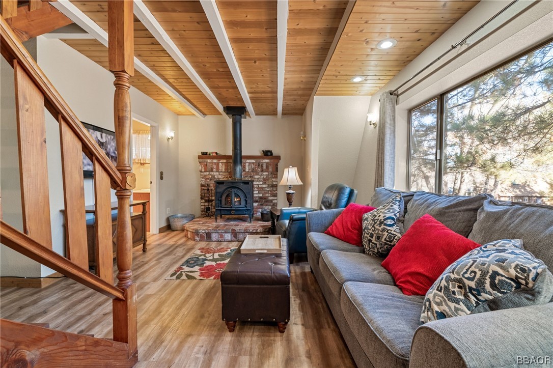 456 Riverside Avenue Sugarloaf, CA 92386 - Photo 7 of 19 a living room with furniture and a large window
