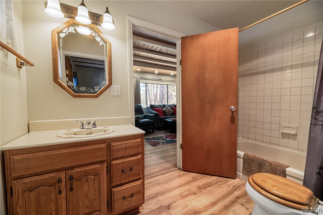 456 Riverside Avenue Sugarloaf, CA 92386 - Photo 9 of 19 a bathroom with a sink a toilet and shower