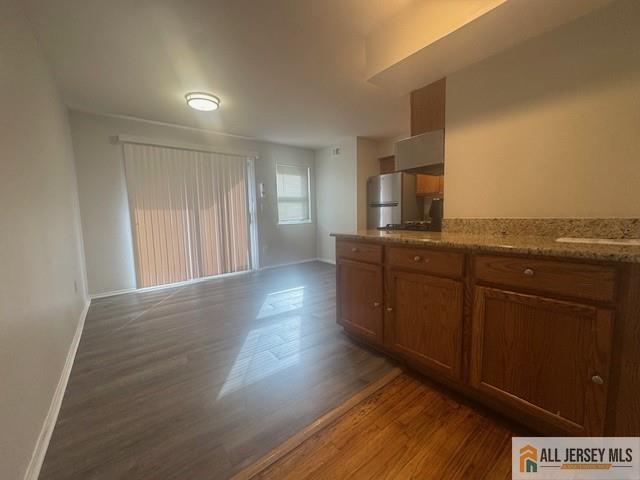 37 Judson Street Edison, NJ 08837 - Photo 4 of 11 a view of a kitchen with wooden floor and a sink