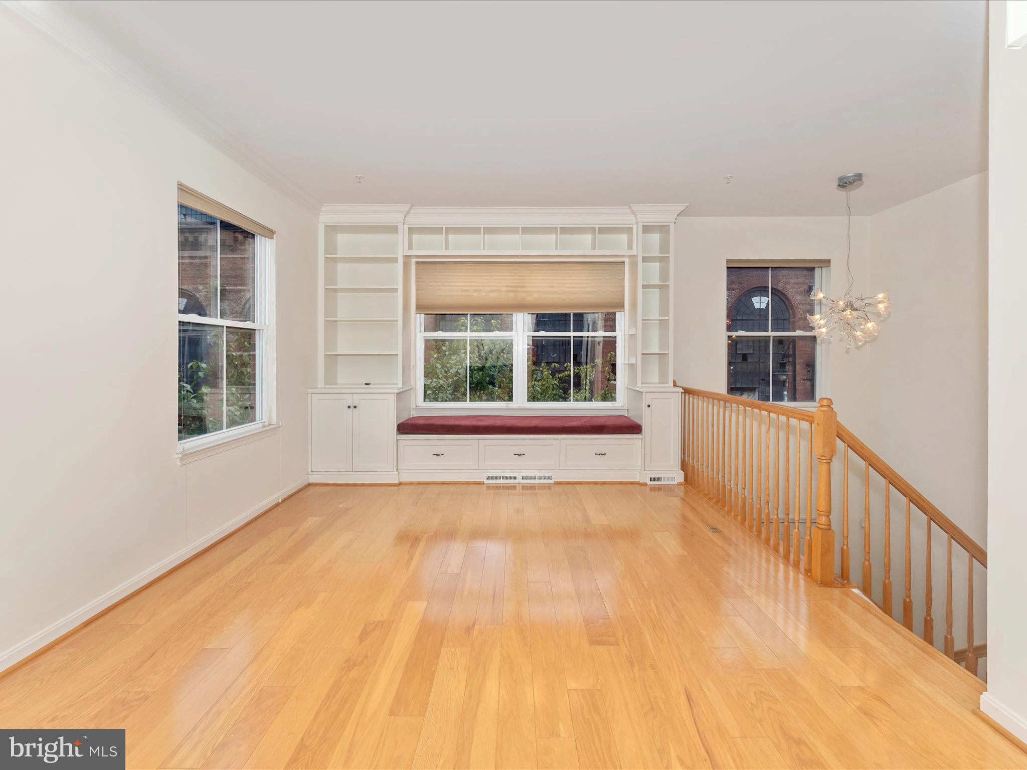 2050 Clipper Park Road Baltimore, MD 21211 - Photo 6 of 58 a view of an empty room with a window
