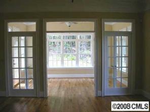 124 Streamwood Road, Unit 15 Troutman, NC 28166 - Photo 8 of 8 a view of an empty room with a window