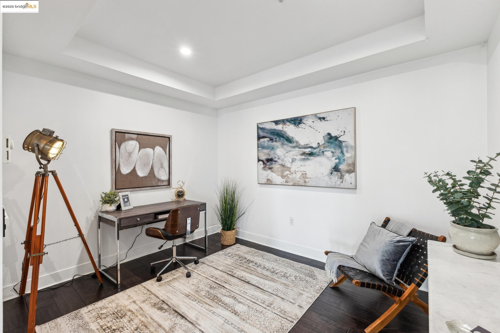 438 West Grand Avenue, Unit 420 Oakland, CA 94612 - Photo 11 of 58 a room with furniture and a rug