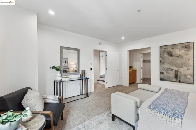 a bathroom with a double vanity sink mirror and shower
