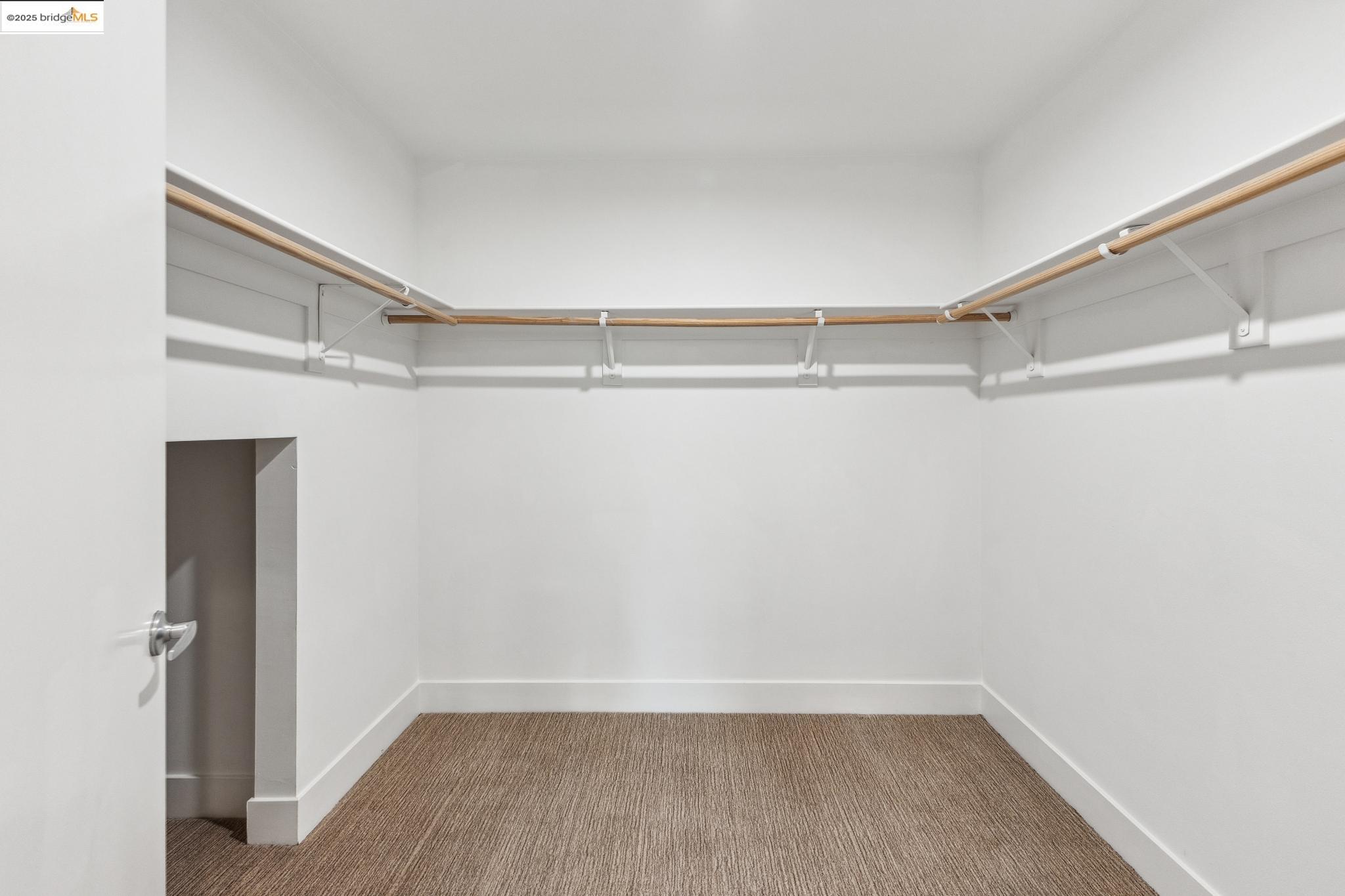 438 West Grand Avenue, Unit 420 Oakland, CA 94612 - Photo 32 of 58 a view of an empty walk in closet