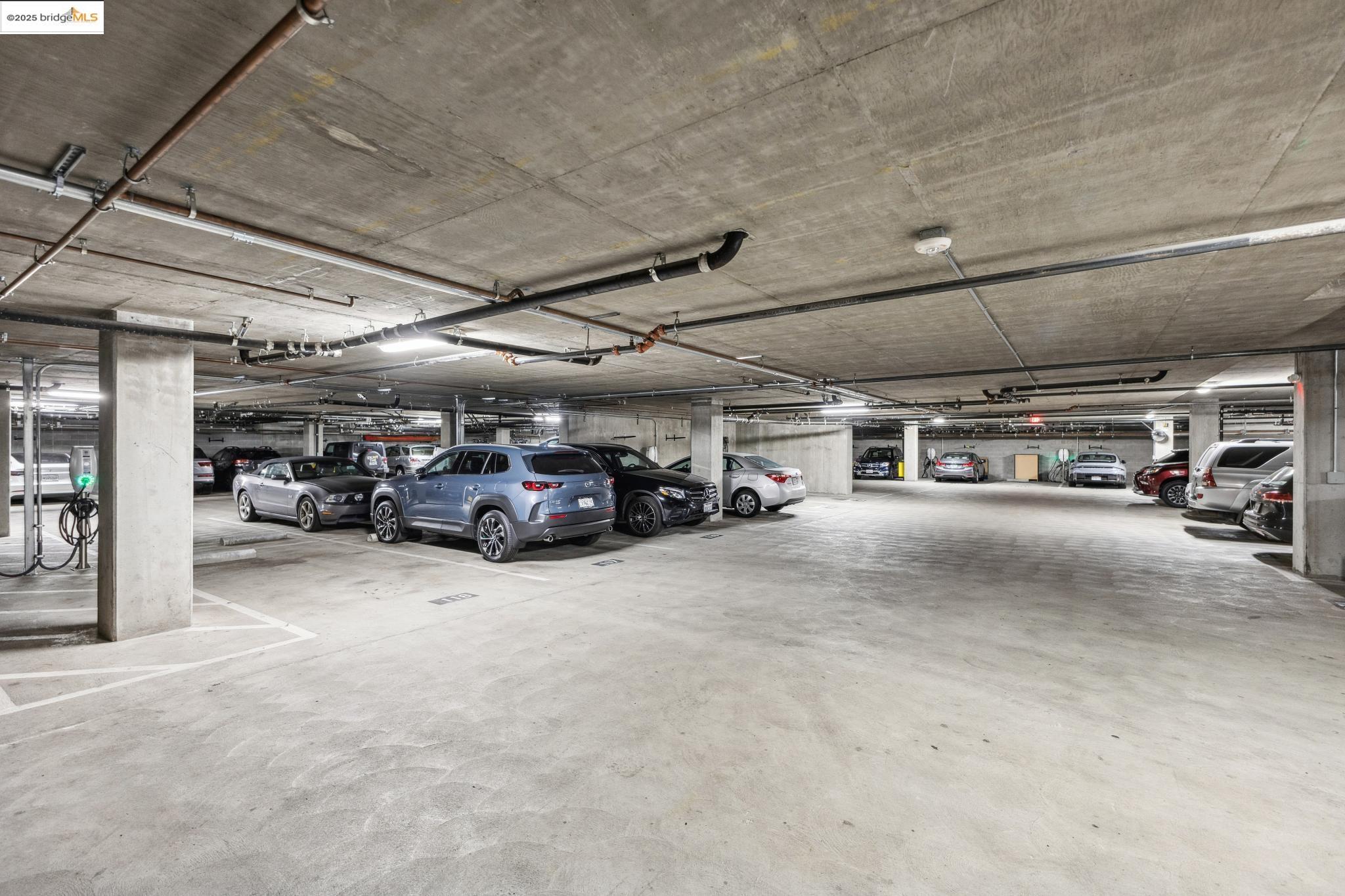 438 West Grand Avenue, Unit 420 Oakland, CA 94612 - Photo 47 of 58 a view of parking garage with cars