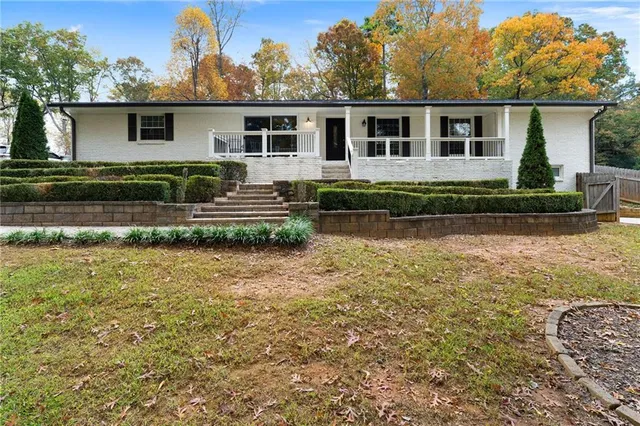 a house view with a outdoor space