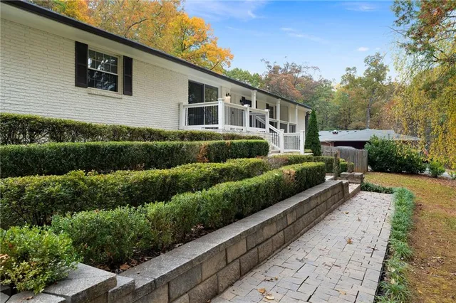 a view of a backyard of the house