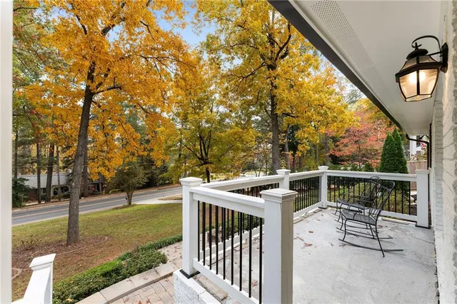 a view of outdoor space with garden and trees