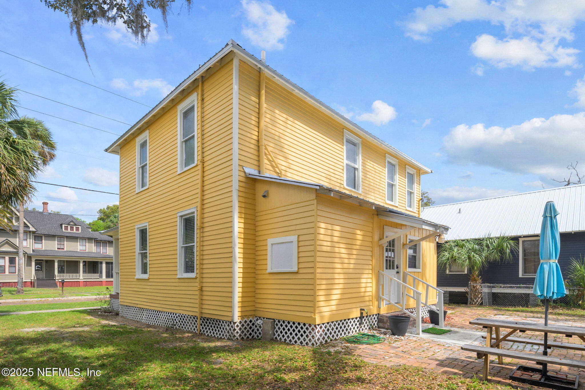 313 Madison Street Palatka, FL 32177 - Photo 32 of 38 a view of a house with a yard