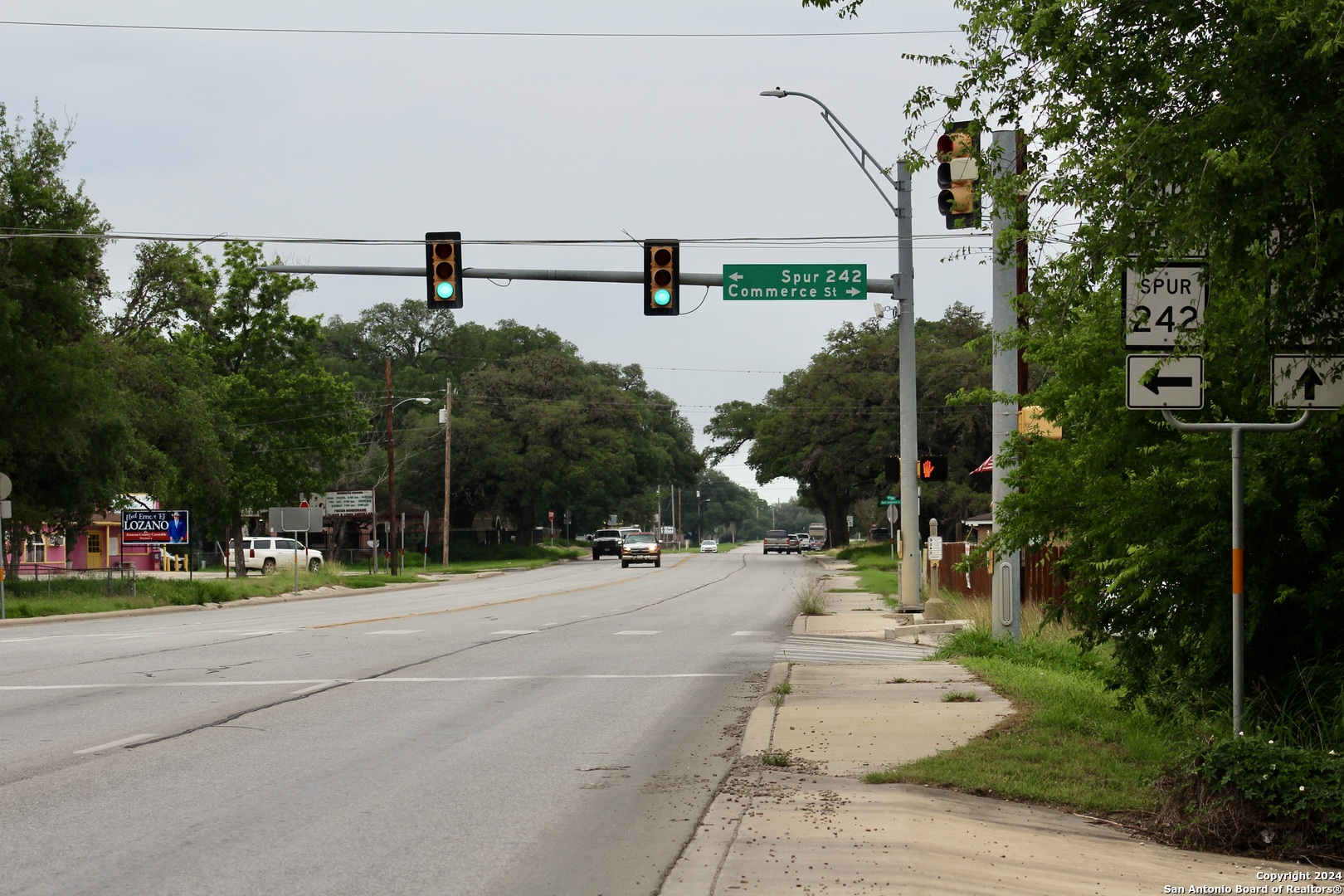 a view of street along with trees