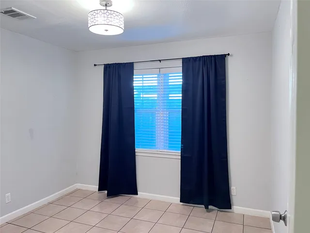 a view of an empty room with window