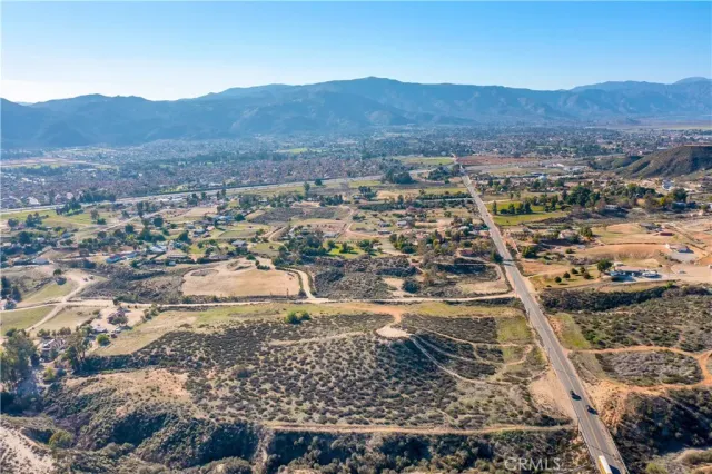 an aerial view of residential house and green space