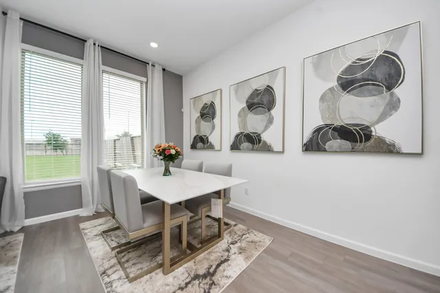 a workspace with furniture and window