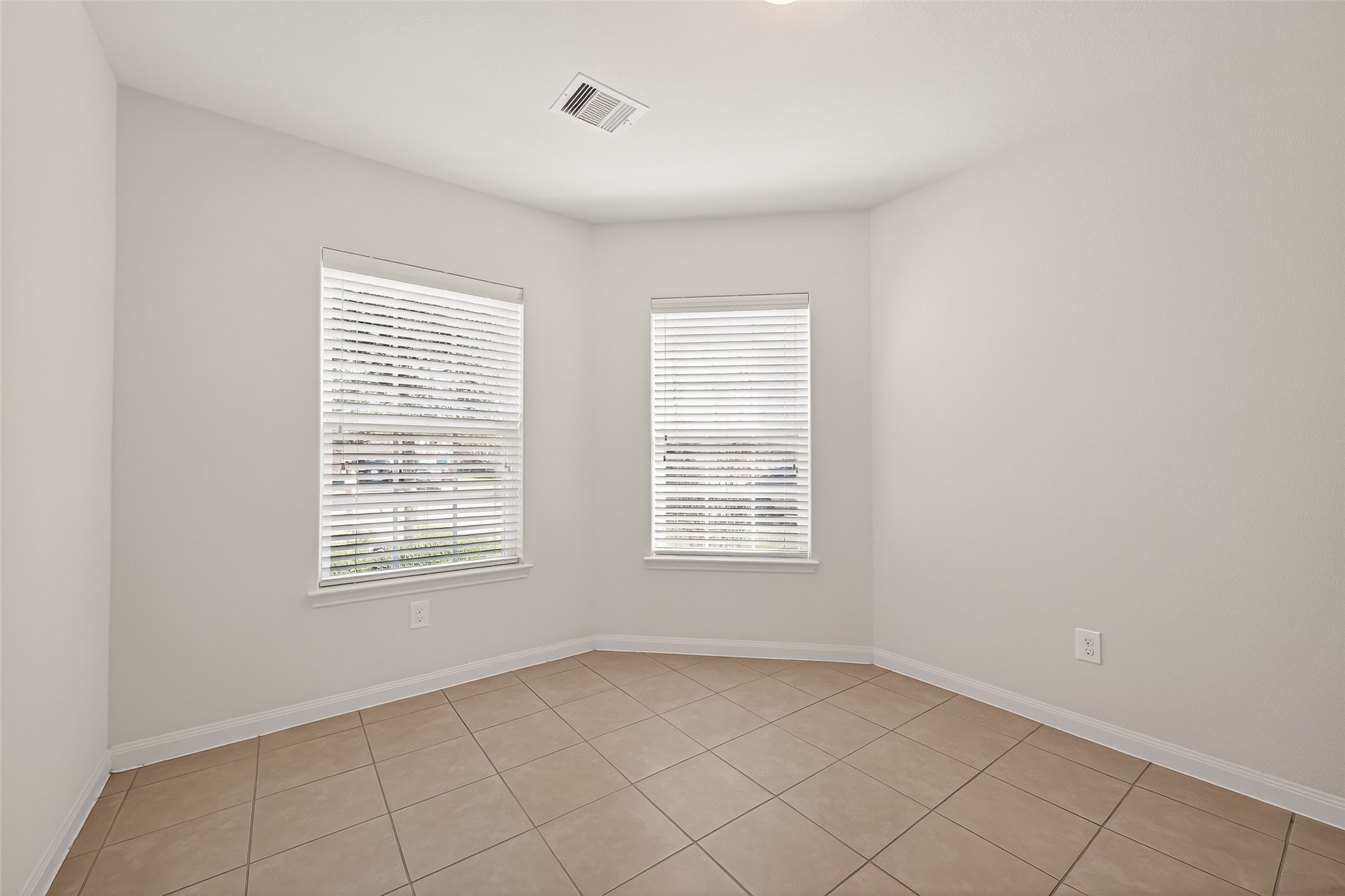 4918 Jagged Cliff Lane Rosenberg, TX 77469 - Photo 3 of 23 an empty room with windows
