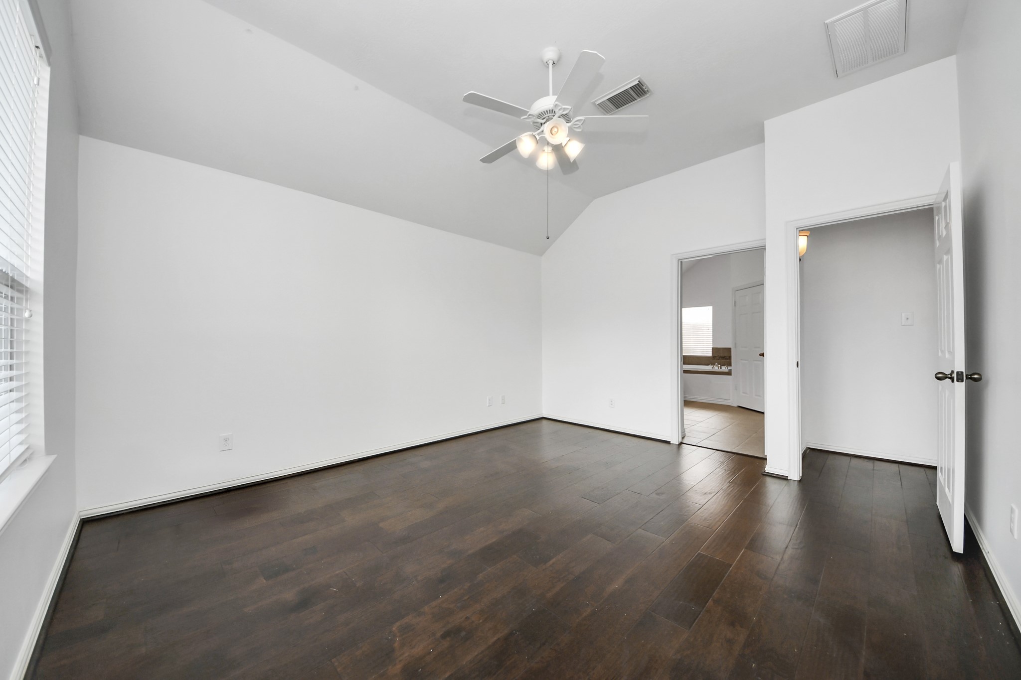 2907 Bright Sky Court Spring, TX 77386 - Photo 13 of 27 a view of an empty room with wooden floor