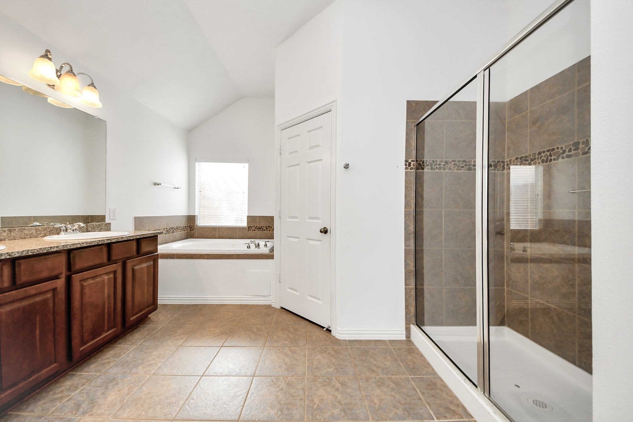 2907 Bright Sky Court Spring, TX 77386 - Photo 16 of 27 a large kitchen with a glass shower door